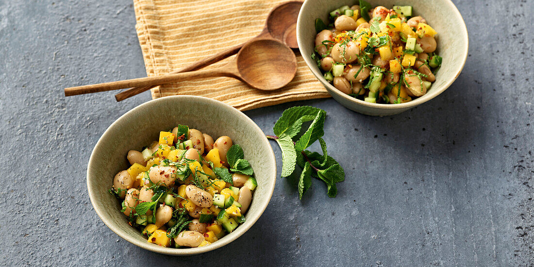 Mango salad with white beans and herbs