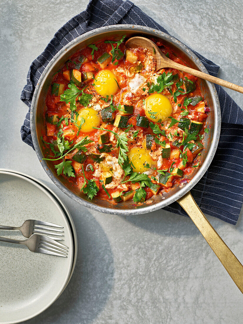 Courgette shakshuka with poached eggs