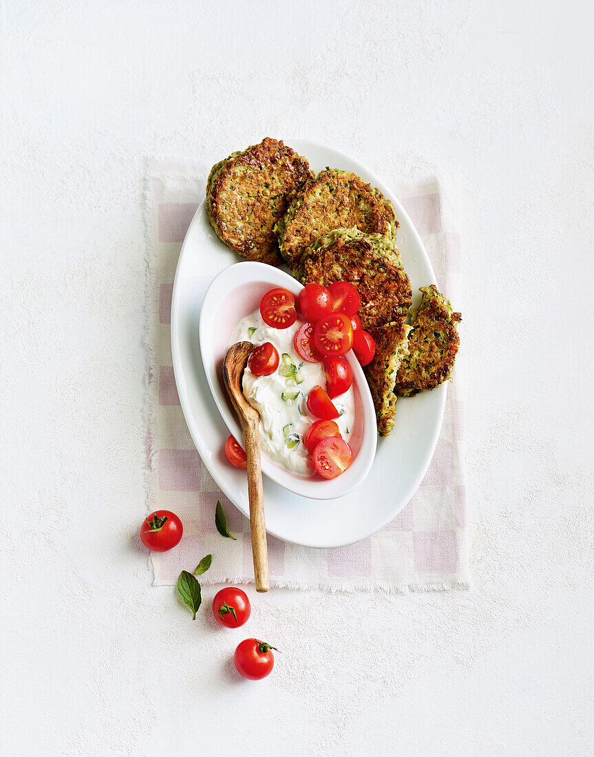 Greek lentil thalers with yoghurt dip and cherry tomatoes