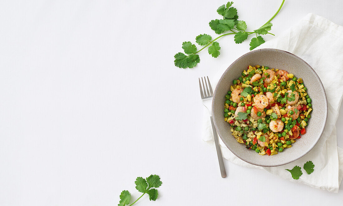 Cauliflower rice with vegetables and prawns