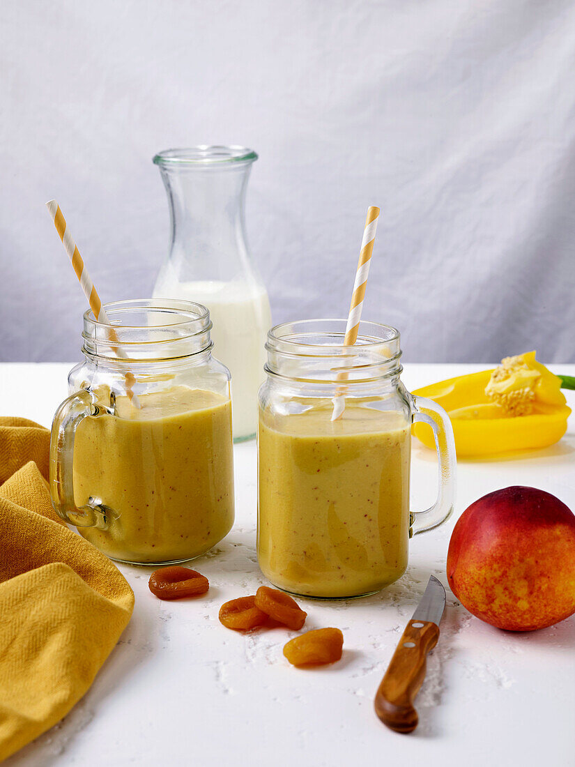 Mango and peach smoothie with dried apricots