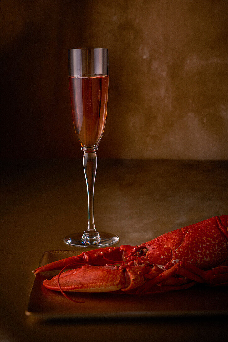 Lobster dazu ein Glas Champagner Rosé