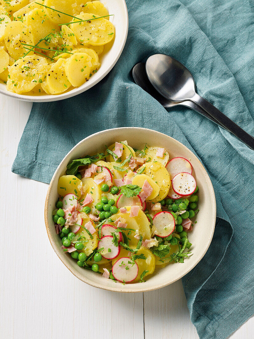 Potato salad with radishes and peas