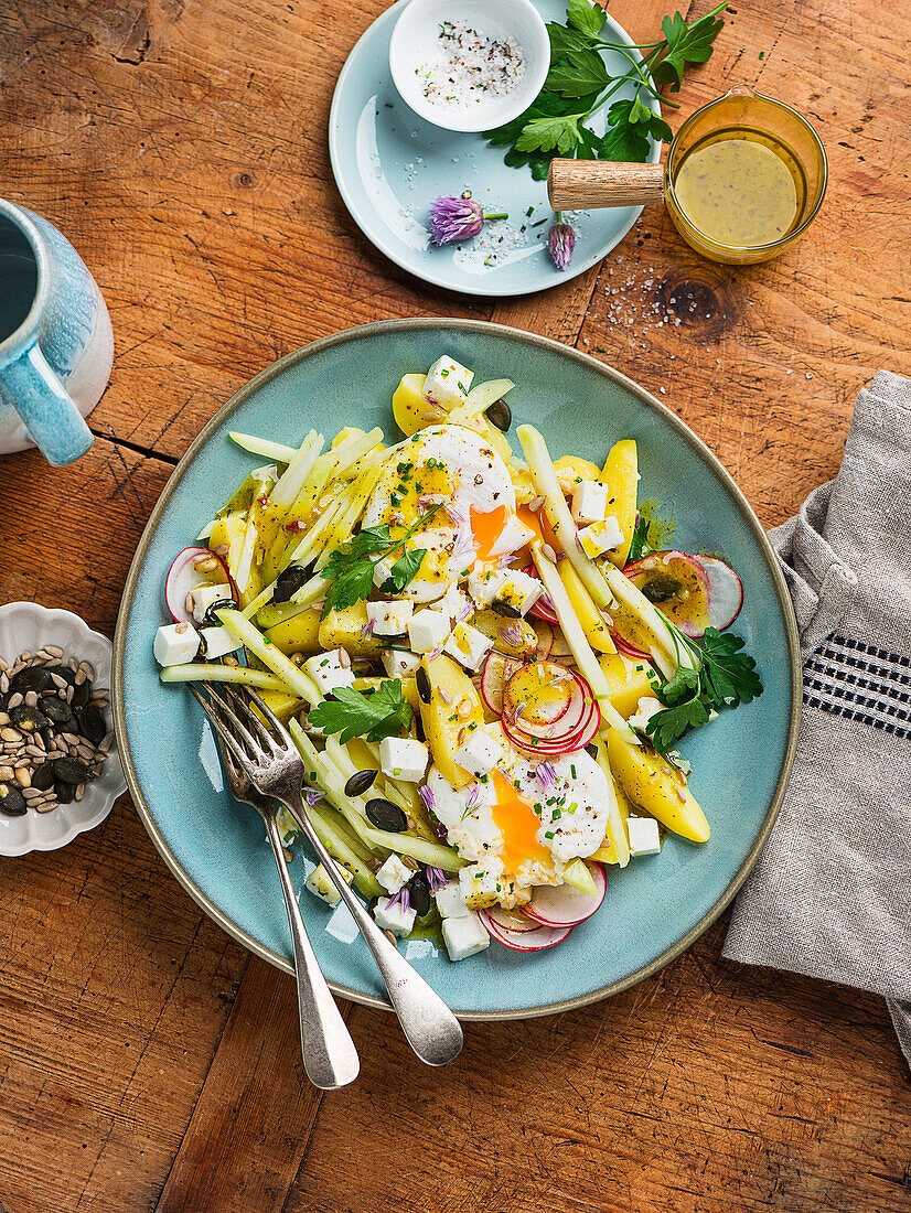 Potato salad with kohlrabi, radish and egg