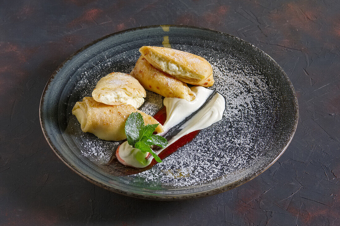 Pancakes with quark filling and sour cream