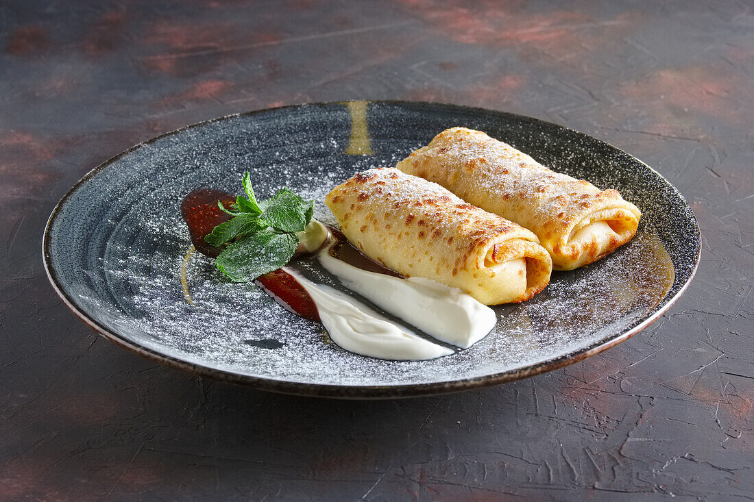 Filled pancakes with quark and sour cream