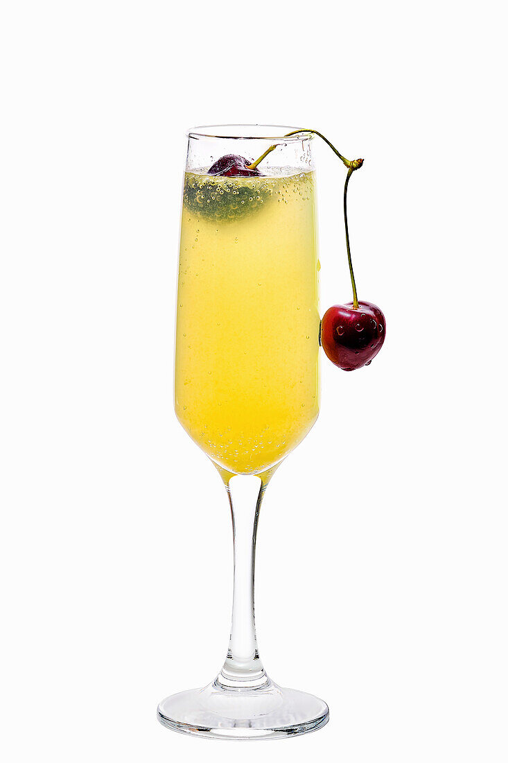 Mimosa cocktail with cherry and orange juice