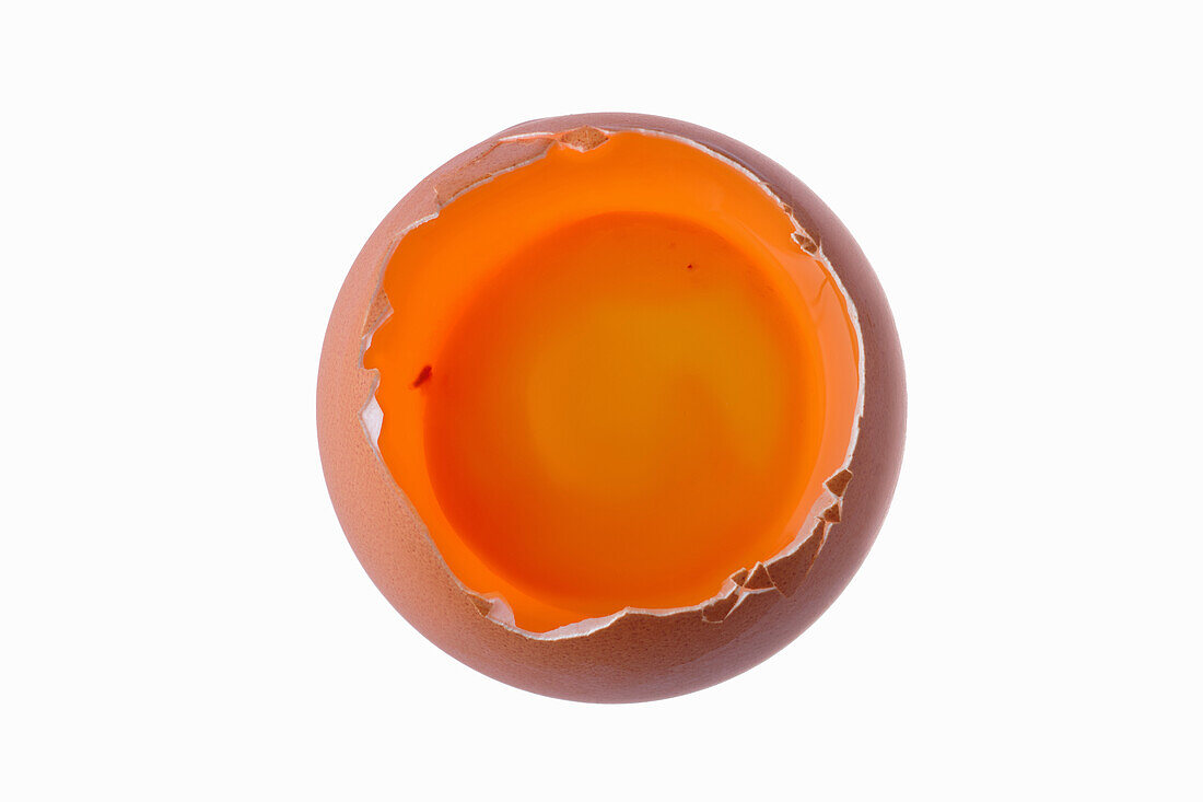 Half-cracked egg with exposed yolk