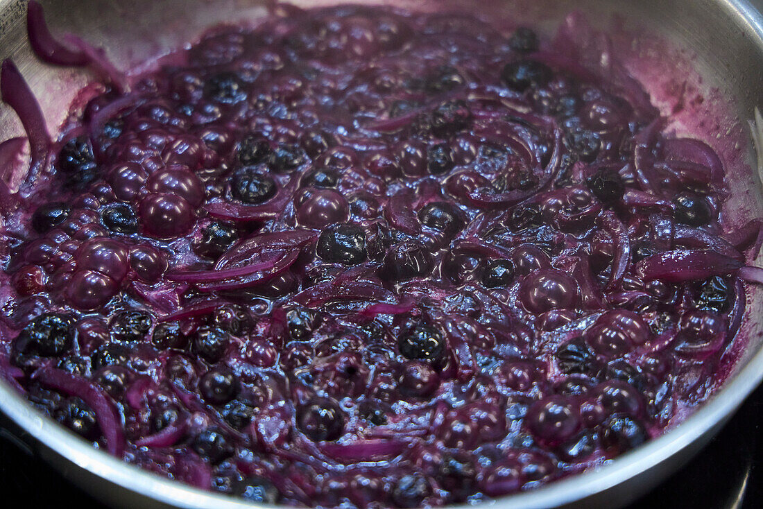 Blueberry and onion chutney in the pan