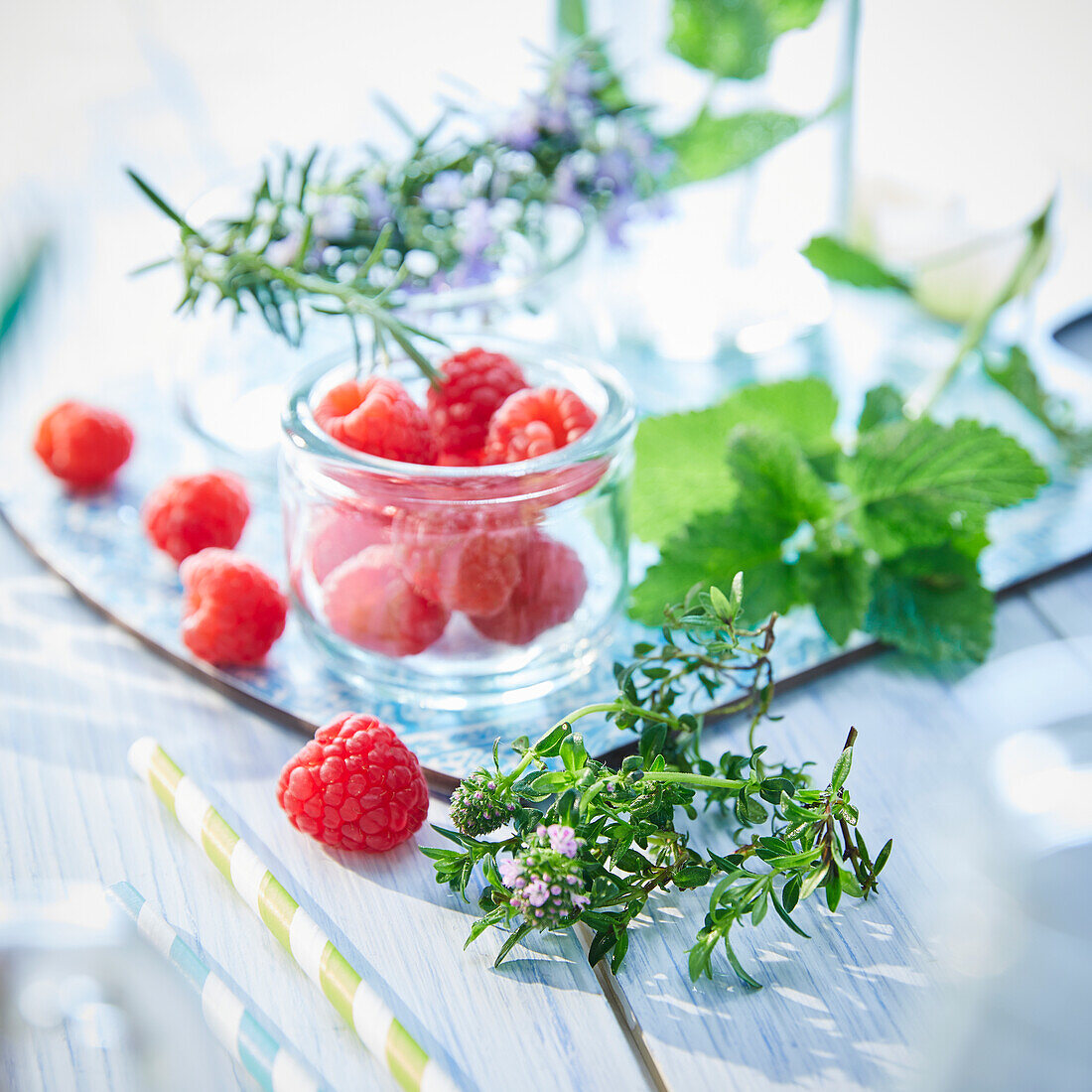 Raspberries with mint, thyme and rosemary