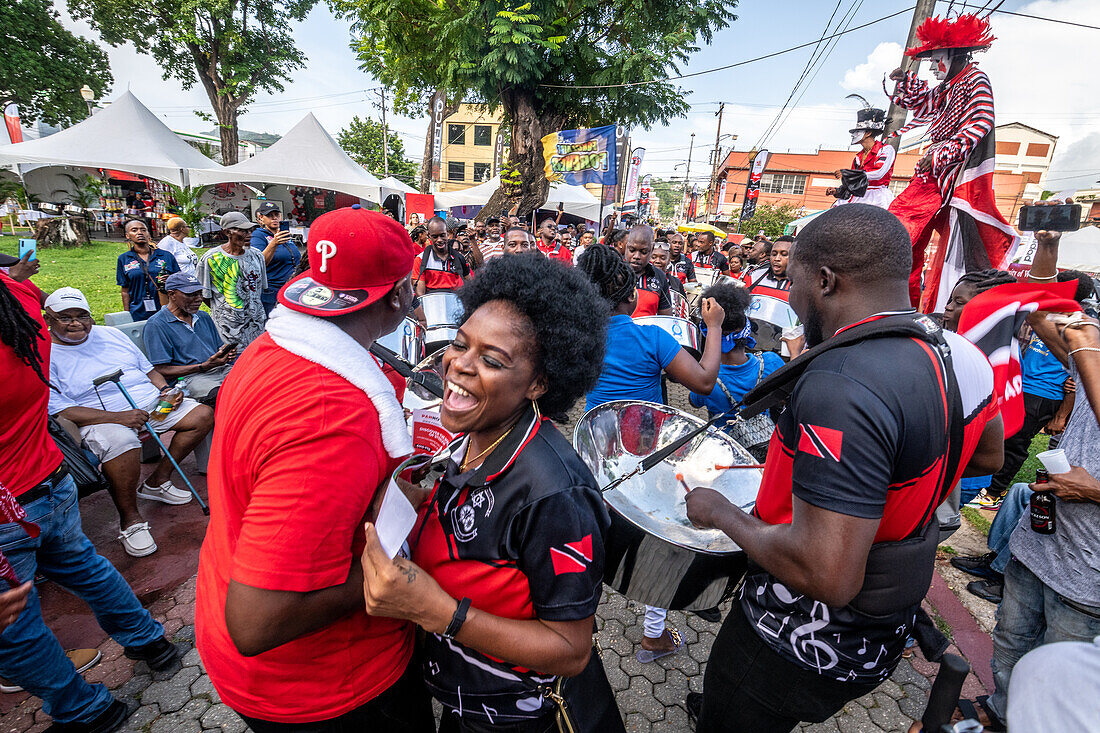 People celebrating World Steel Pan Day Parade in Trinidad and Tobago