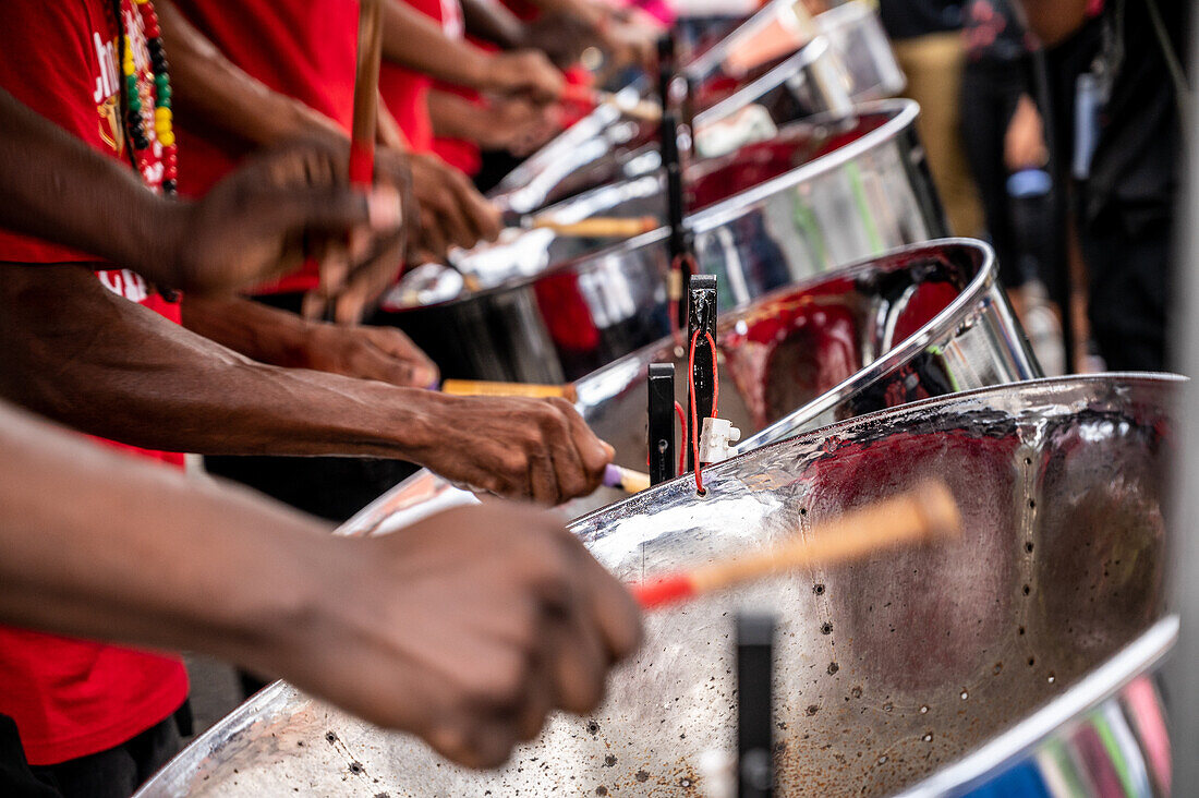 Pannists playing the steel pan on World Steel Pan Day Trinidad and Tobago