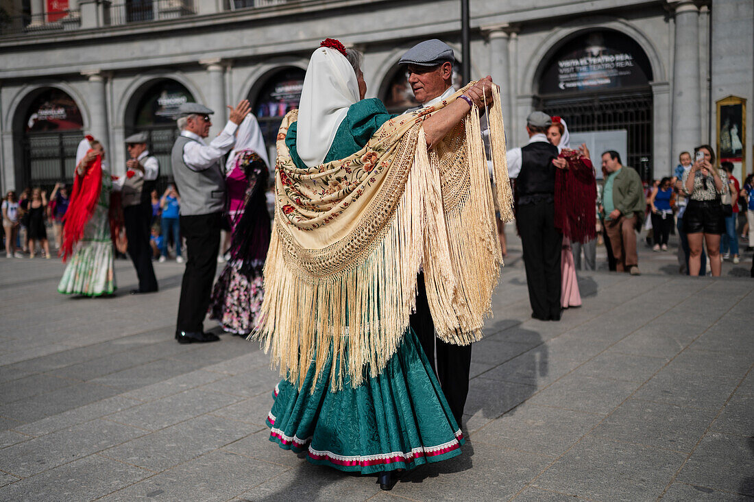 Mature dancers dance the traditional chotis during the San Isidro festivities in Madrid, Spain