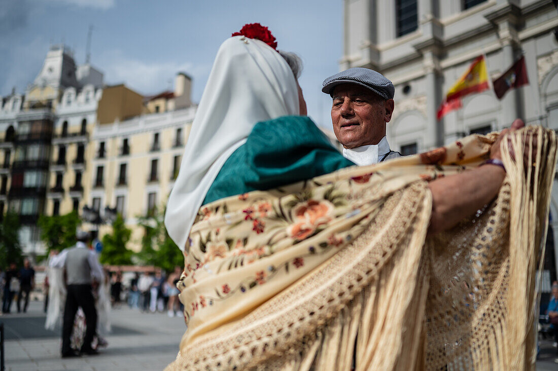 Mature dancers dance the traditional chotis during the San Isidro festivities in Madrid, Spain