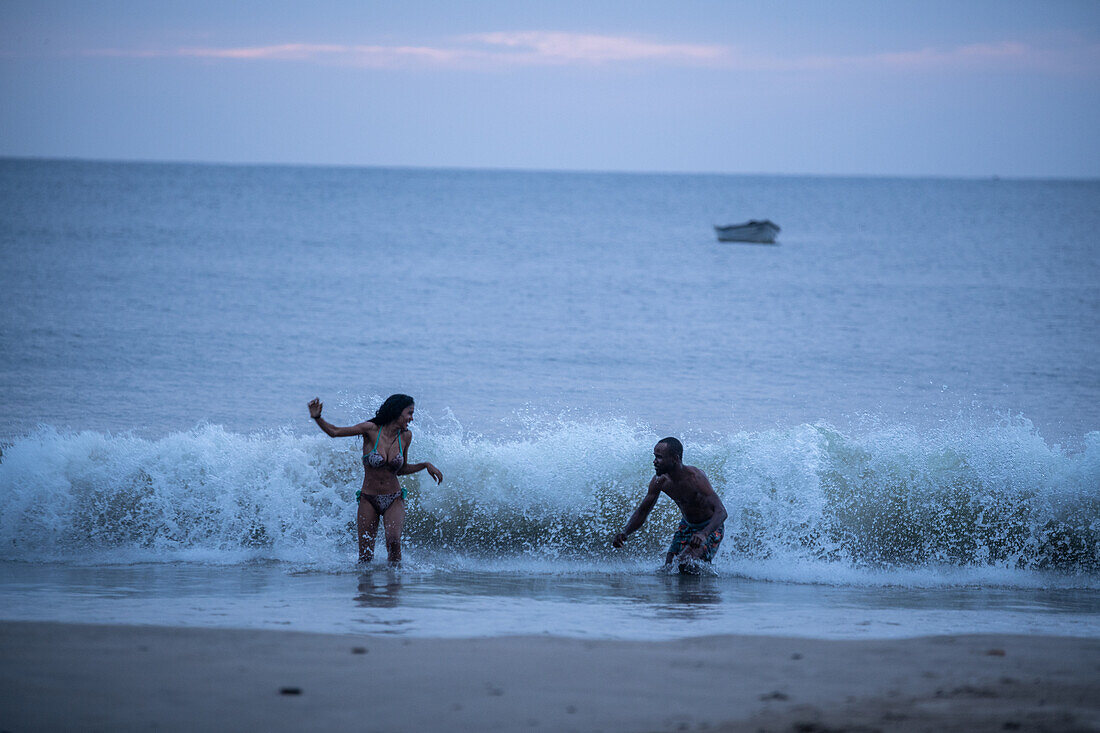 People at Las Cuevas beach in Trinidad and Tobago