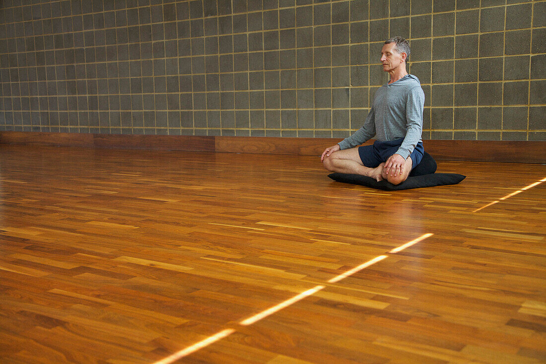 Mature Man Practicing Yoga, Easy pose