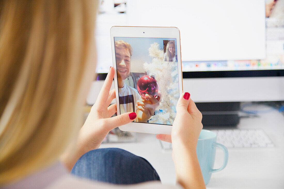 Woman Having Video Call with Man at Christmas