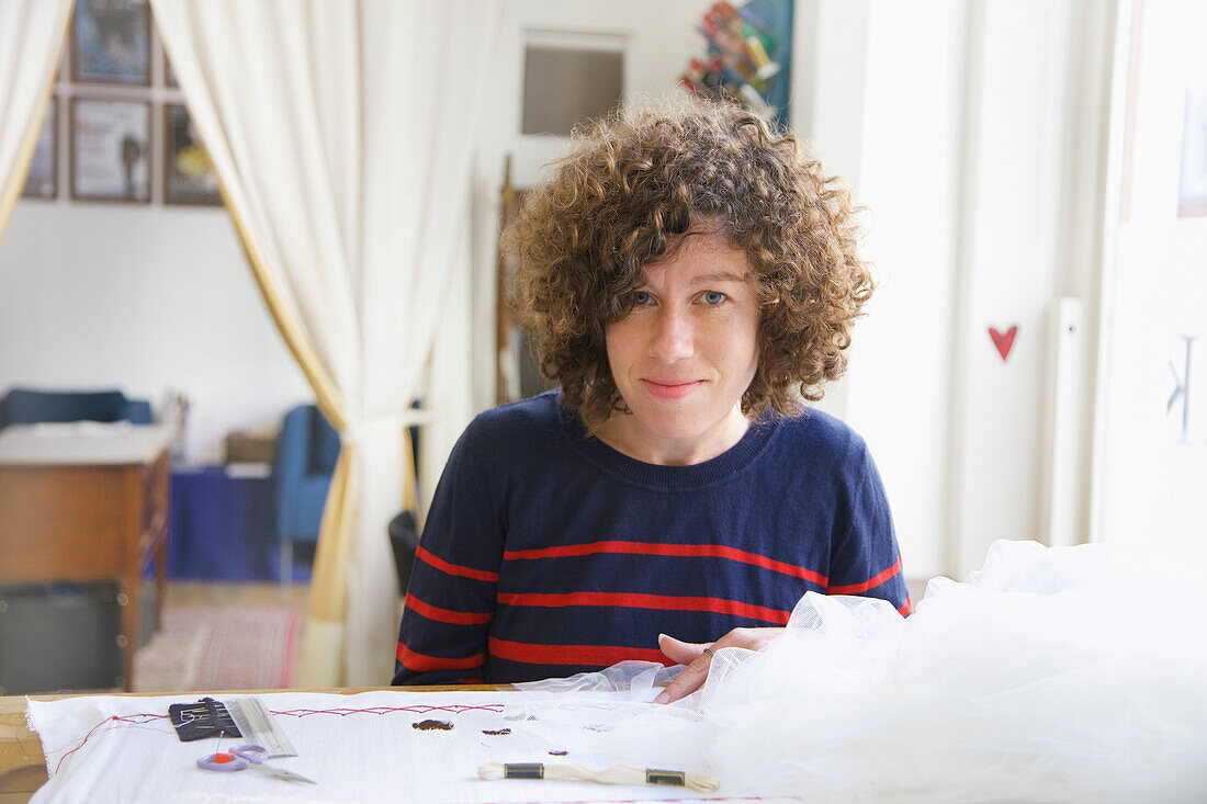 Portrait of Female Employee at Embroidery Design Studio