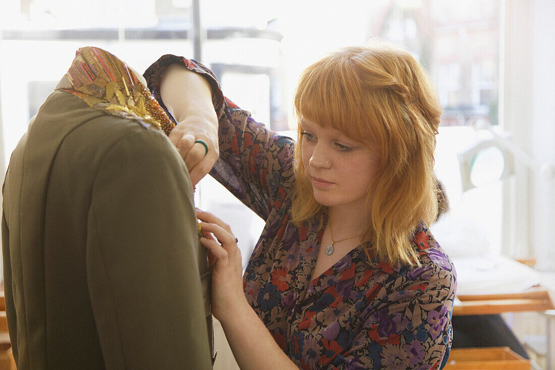 Seamstress Working on Dummy