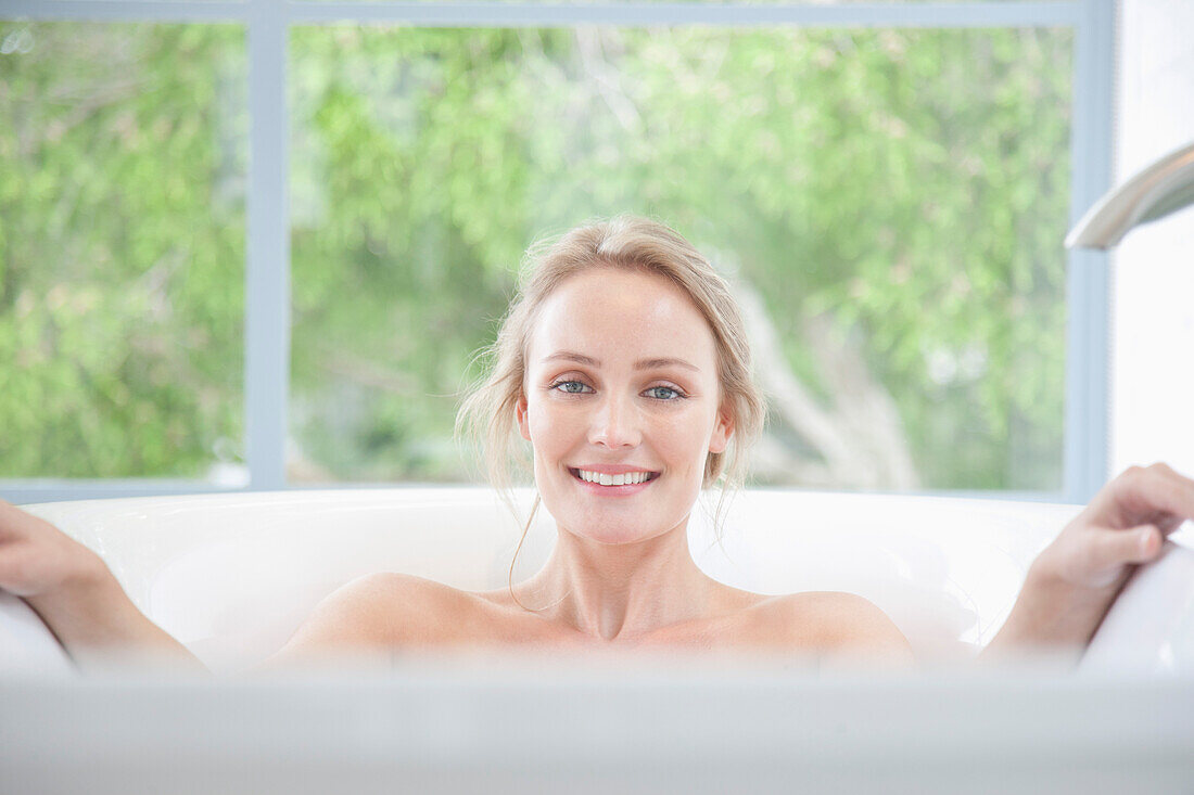 Smiling Woman in Bathtub