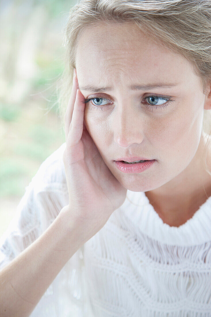 Portrait of Concerned Young Woman