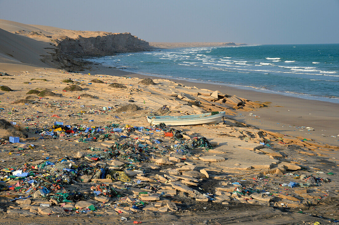 Sultanate of Oman,East Coast,Indian ocean,a huge amount of multicolored plastic garbage is abandonned on a wild beach