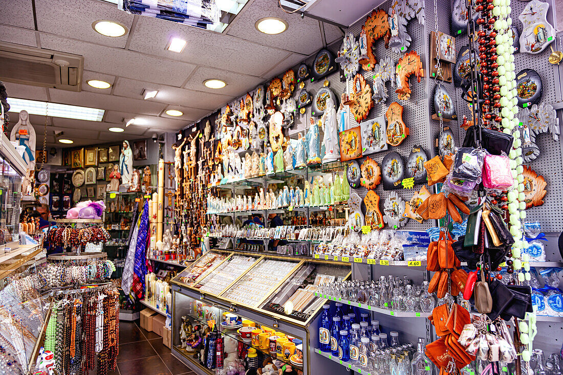 LOURDES - JUNE 15,2019: Religious icons of a store in the city of Lourdes,France