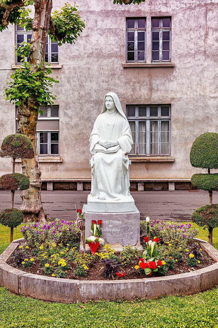 LOURDES - JUNE 15,2019 : Statue of saint Therese of child Jesus