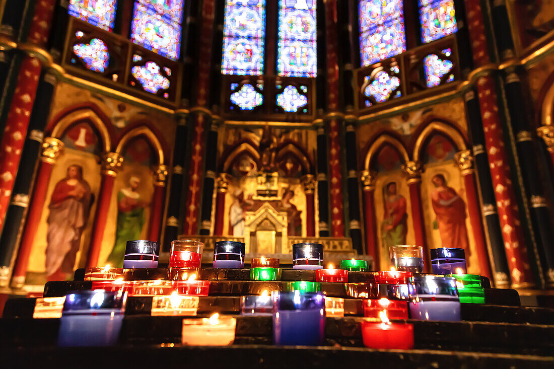 Christmas candles burning at interior of Bayonne cathedral (Sainte-Marie cathedral)