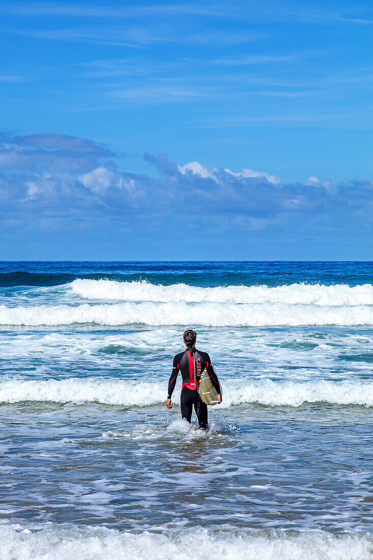 San Sebastian,Spain - September 07,2019 - View of a surfer watching the waves