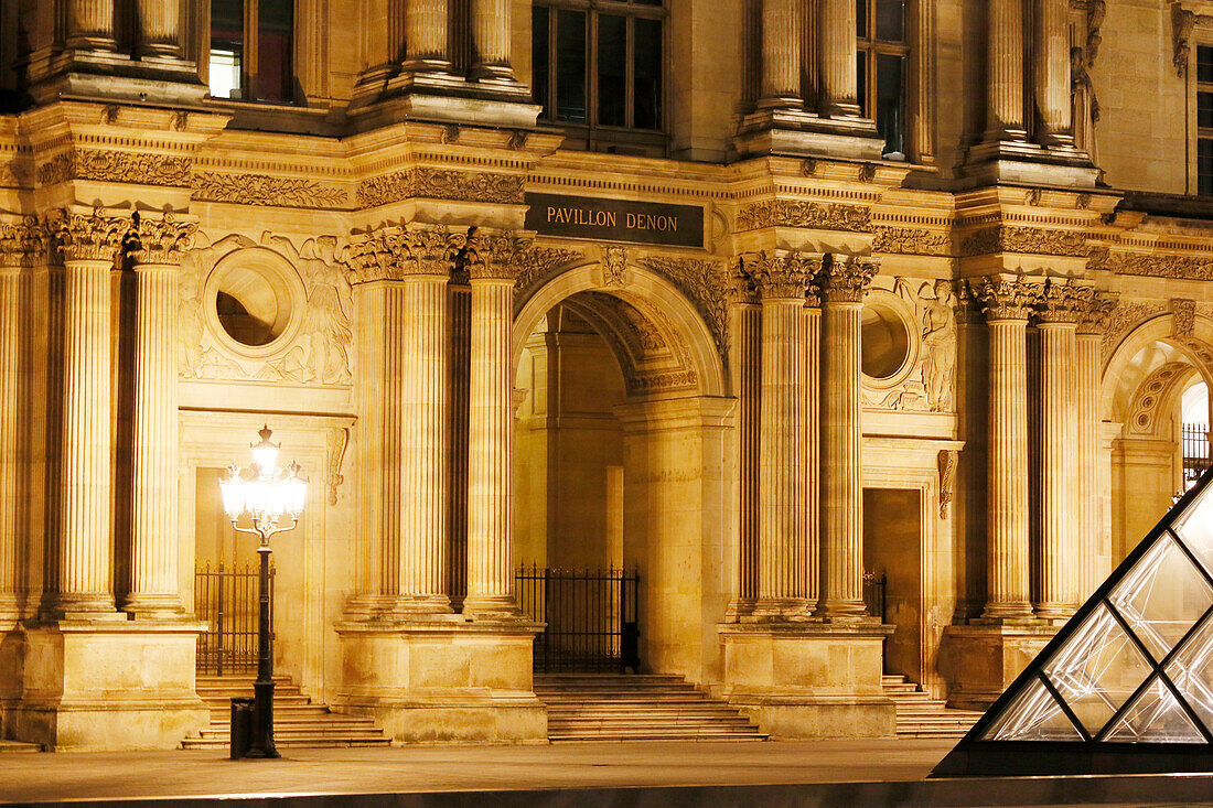 Paris. 1st district. Louvre Museum by night. Facade of the Denon Pavilion.