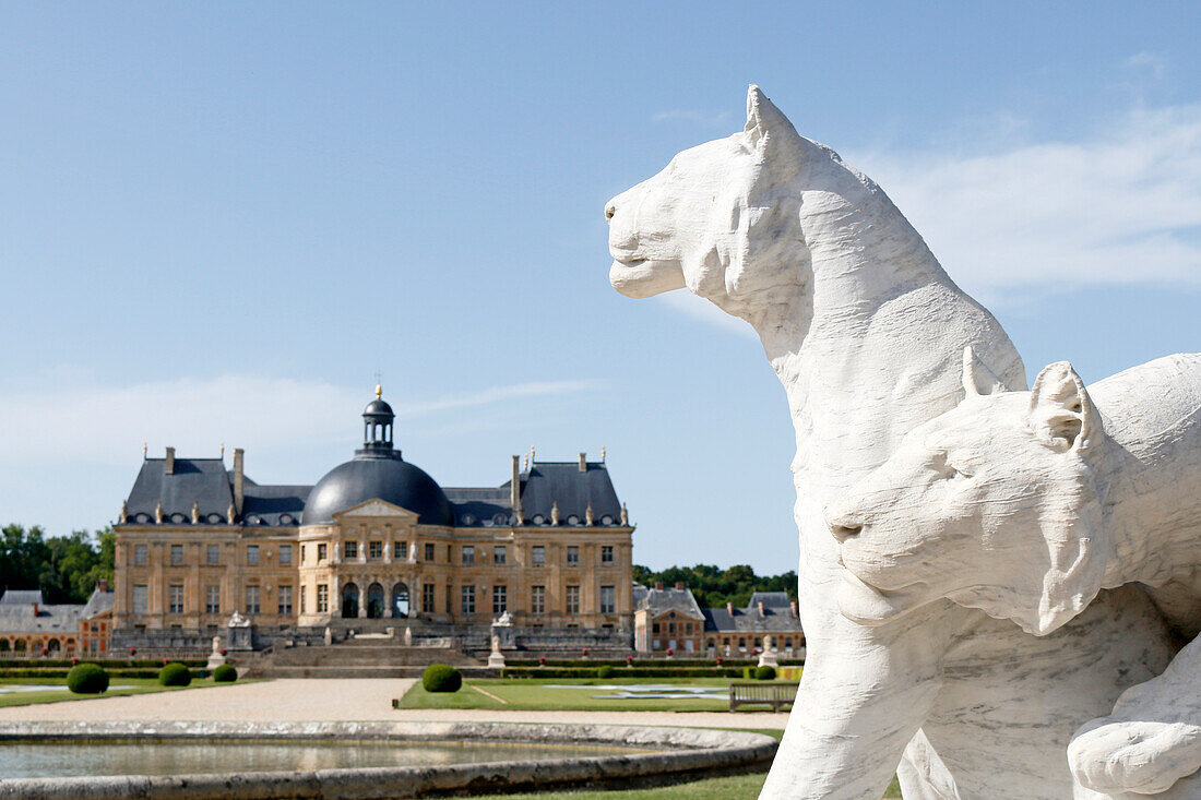 France. Seine et Marne. Castle of Vaux le Vicomte. View of the southern facade from the gardens. Statues representing lions.