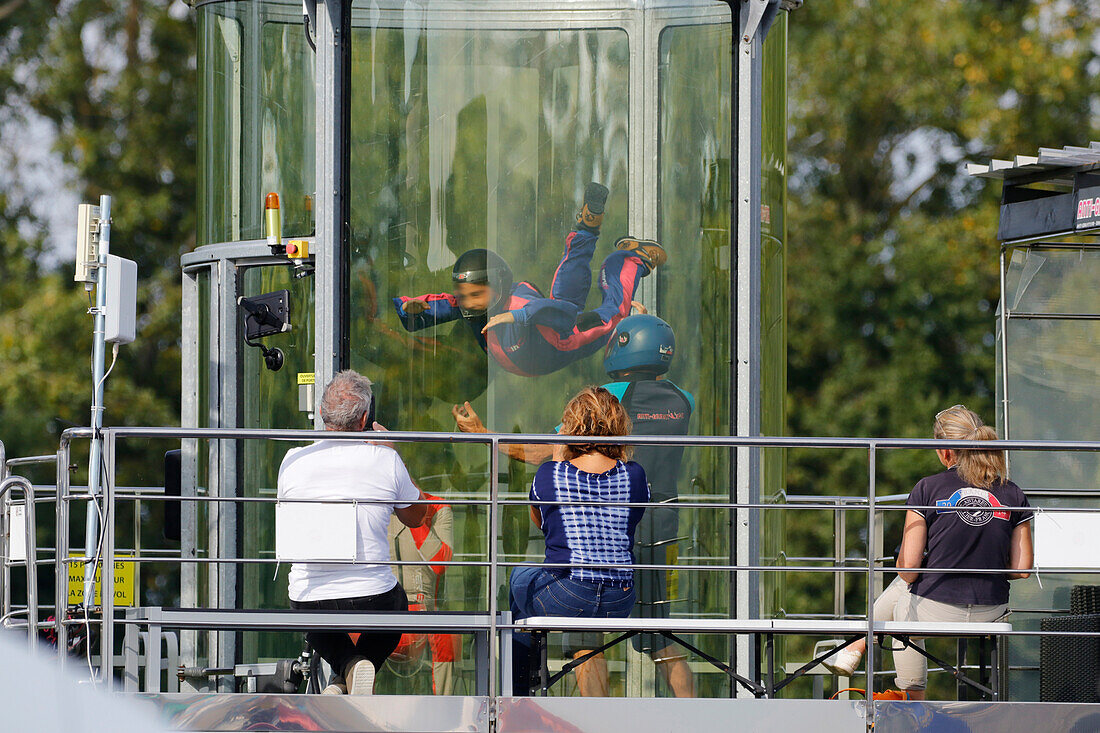 France. Seine et Marne. Melun. Airshow 2021. Free fall simulator. Child,teenager doing a baptism of free fall in front of his parents.