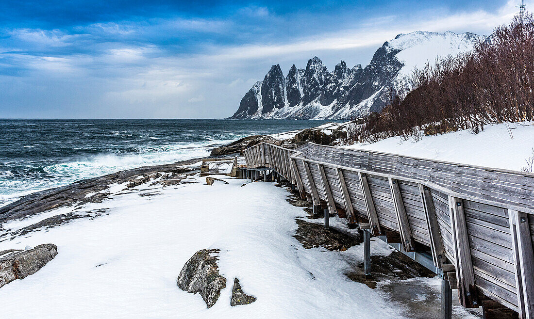 Norway,city of Tromso,Island of Senja,observation bridge of the Tungenesset Mountains (Devil's Teeth) on the Steinfjord