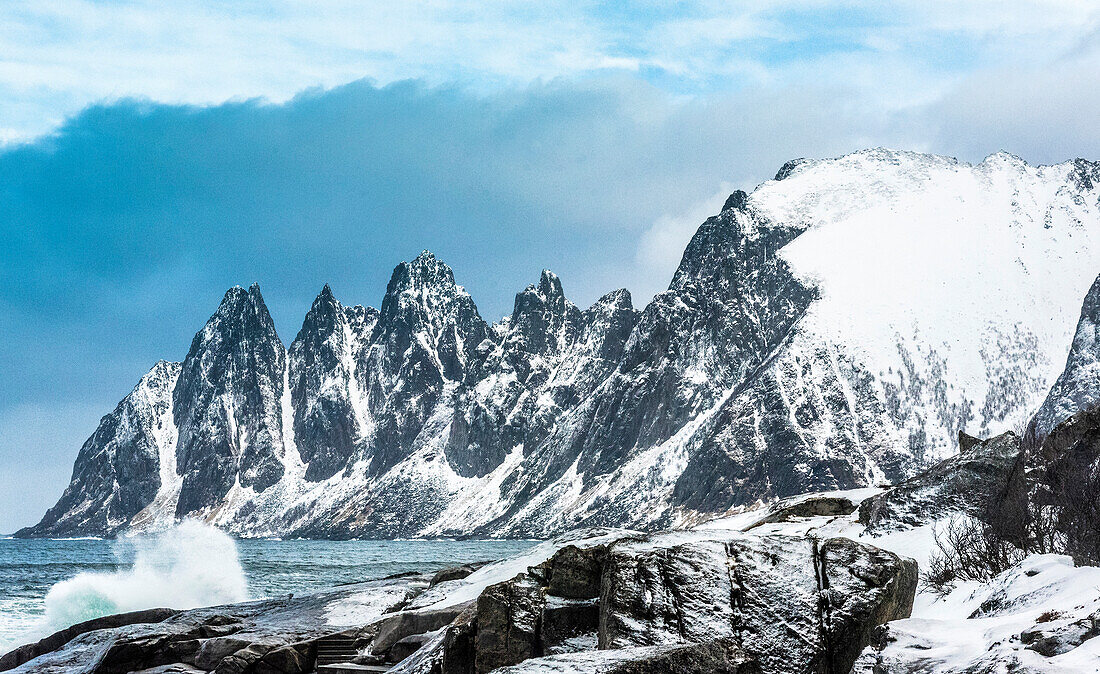 Norway,city of Tromso,Island of Senja,Tungenesset Mountains (Devil's Teeth),seen from the Steinfjord