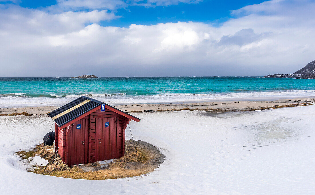 Norway,city of Tromso,Island of Senja,outhouse on the bank of a fjord