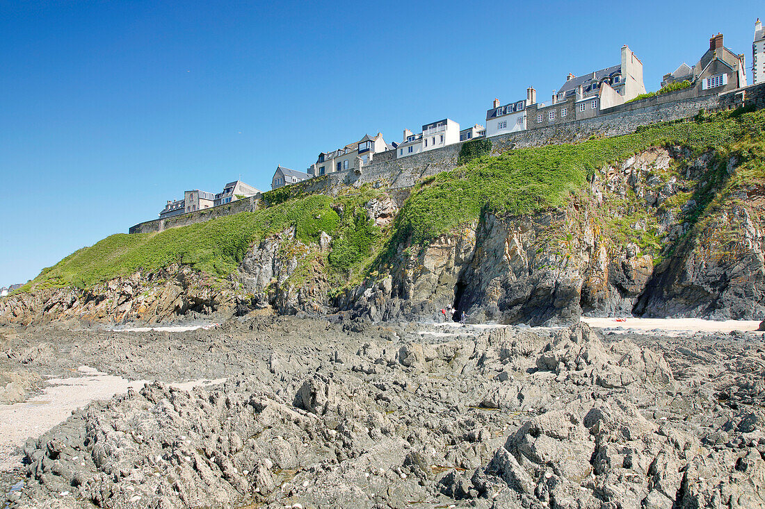 France. Normandy. Department of Manche. Granville during the summer. View from the coast and part of the beach. The upper town.