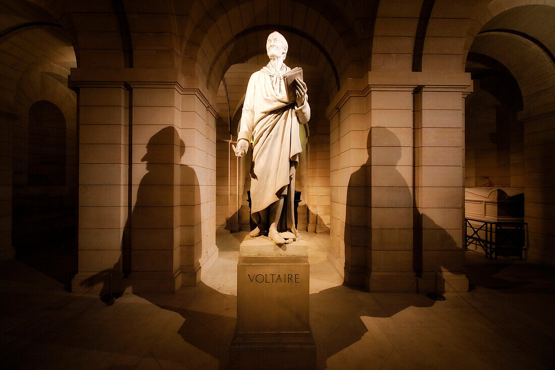 France. Paris. 5th district. The Pantheon. The crypt. Tomb and sculpture of Voltaire.