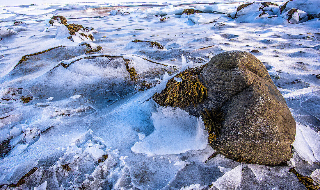 Norway,City of Tromso,Island of Senja,close-up shot of the ice on the sides of a fjord