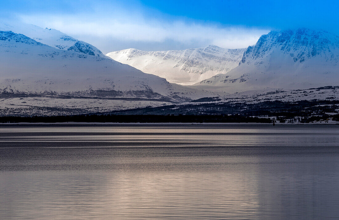 Norway,city of Tromso,Island of Senja,lake in a snowy landscape