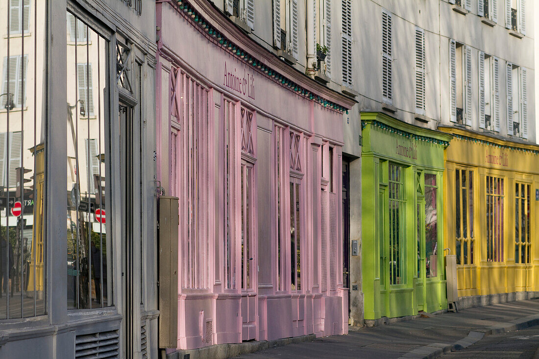 France,Paris,75,10th ARRT,Quai de Valmy,on the Canal Saint-Martin,front window "Chez Antoine et Lili",clothing shop for women,decorative objects and hand crafted objects