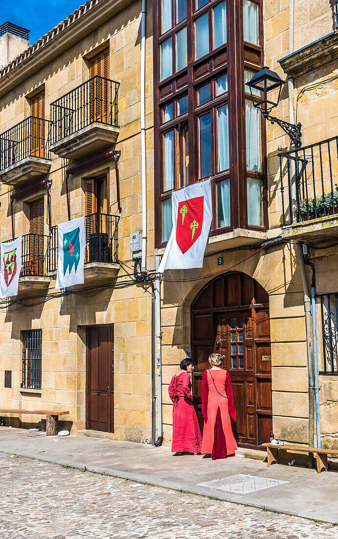 Spain,Rioja,Medieval Days of Briones (festival declared of national tourist interest),participants costumed in front of a typical house