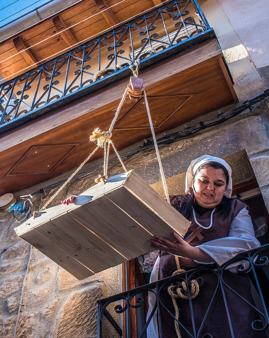 Spain,Rioja,Medieval Days of Briones (declared a festival of national tourist interest),costumed woman on her balcony