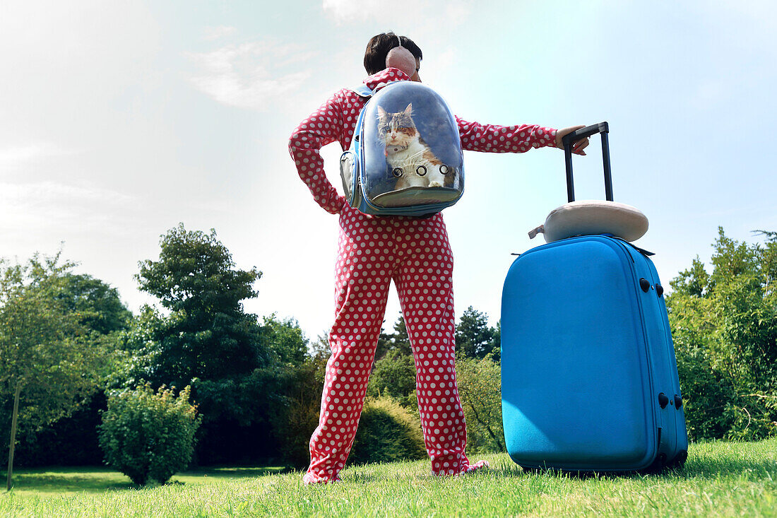 Woman going on a trip with a cat.