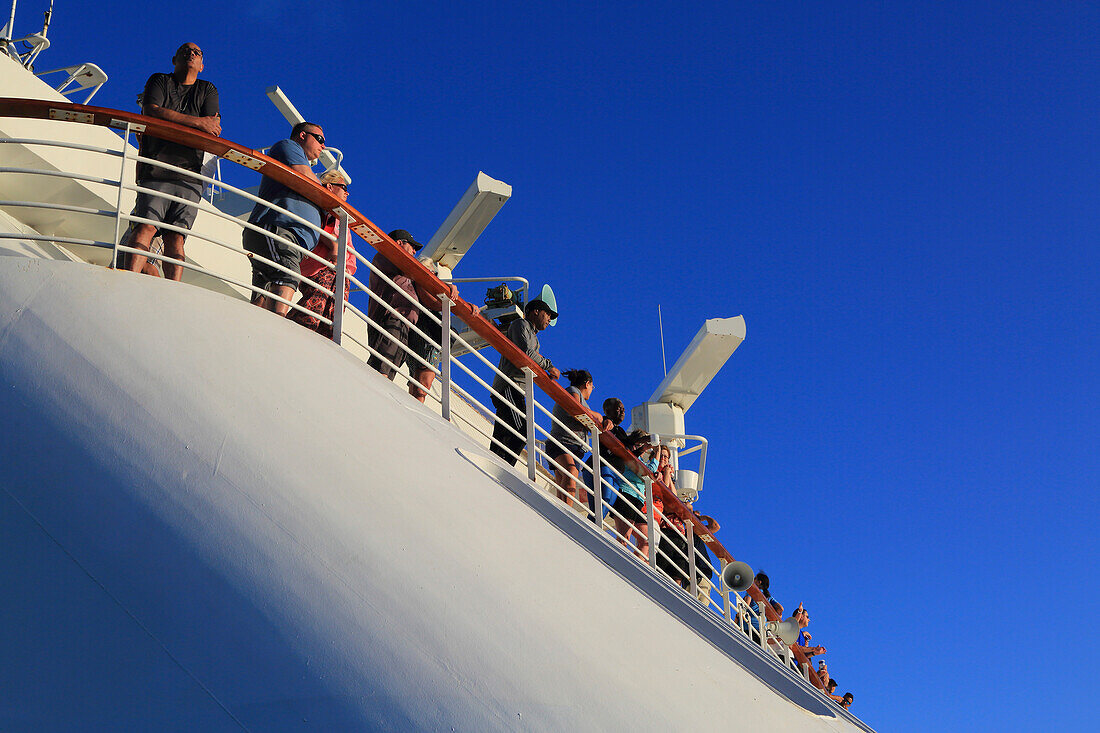 Cruiser leaning on a railing.