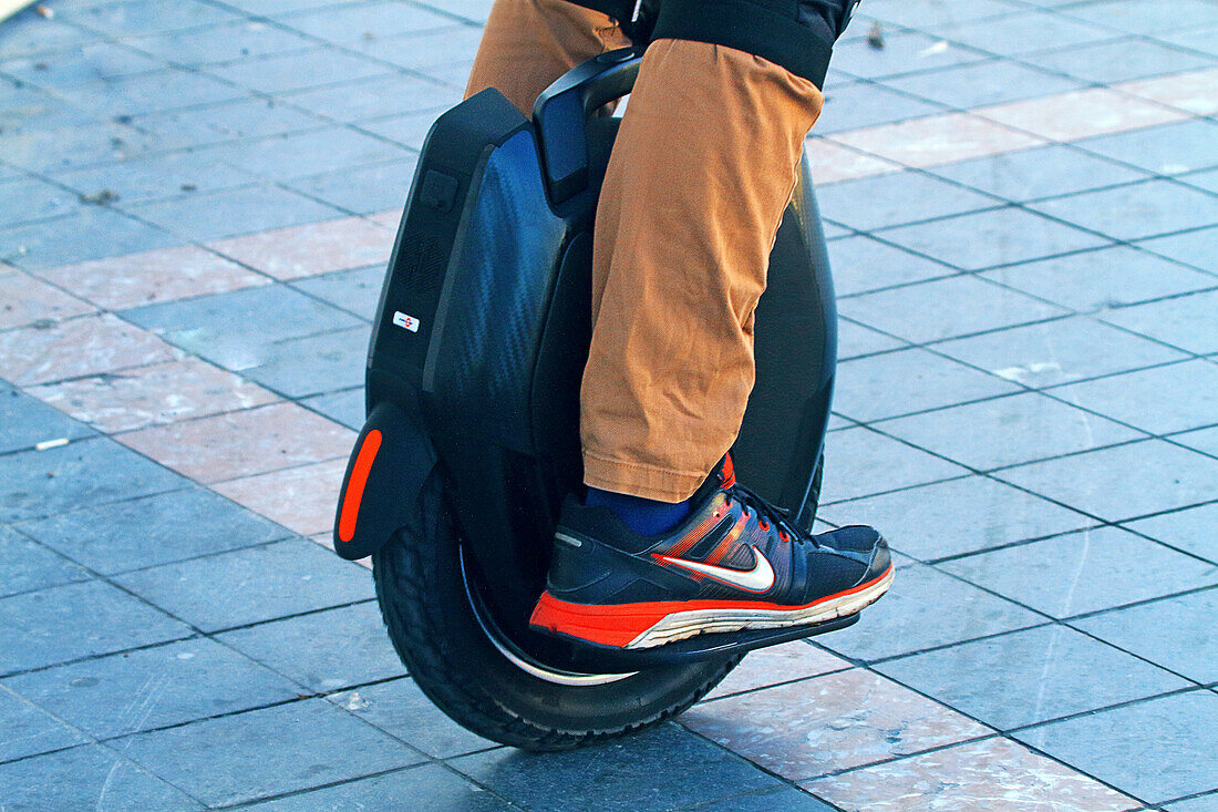 Man on self-balancing unicycle