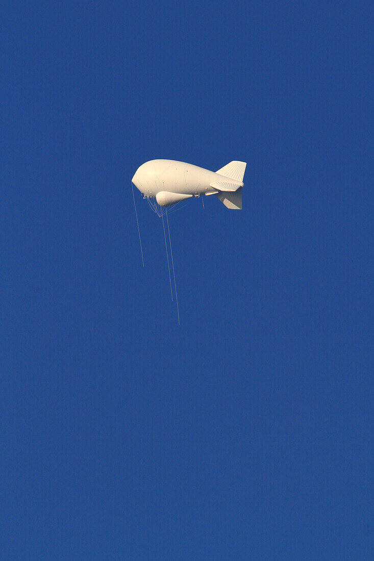 Usa,Florida,weather balloon in a blue sky.