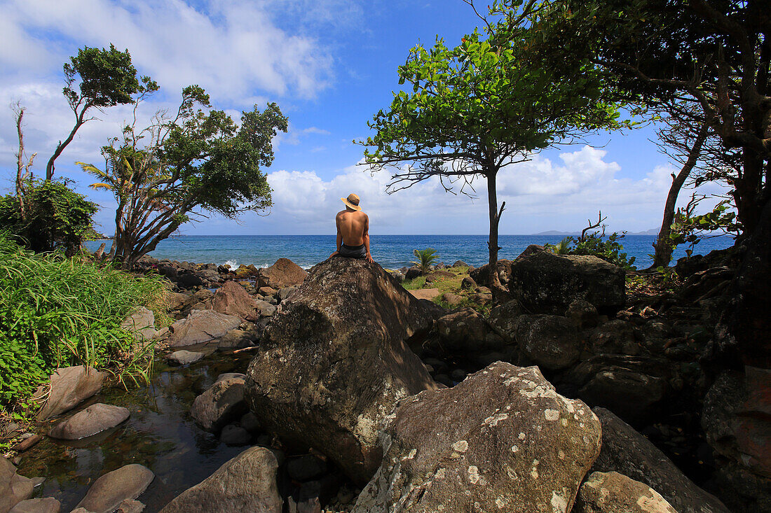 France,French Antilles,Guadeloupe.Man at seashore