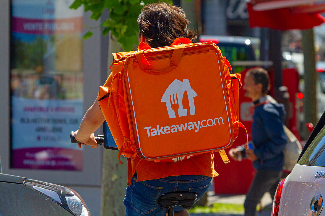 Luxembourg ,back delivery man,on foot with his bag