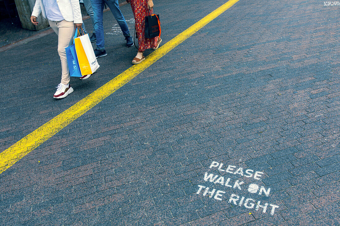 Europe,Nederlands. Line for distancing in a shopping street.